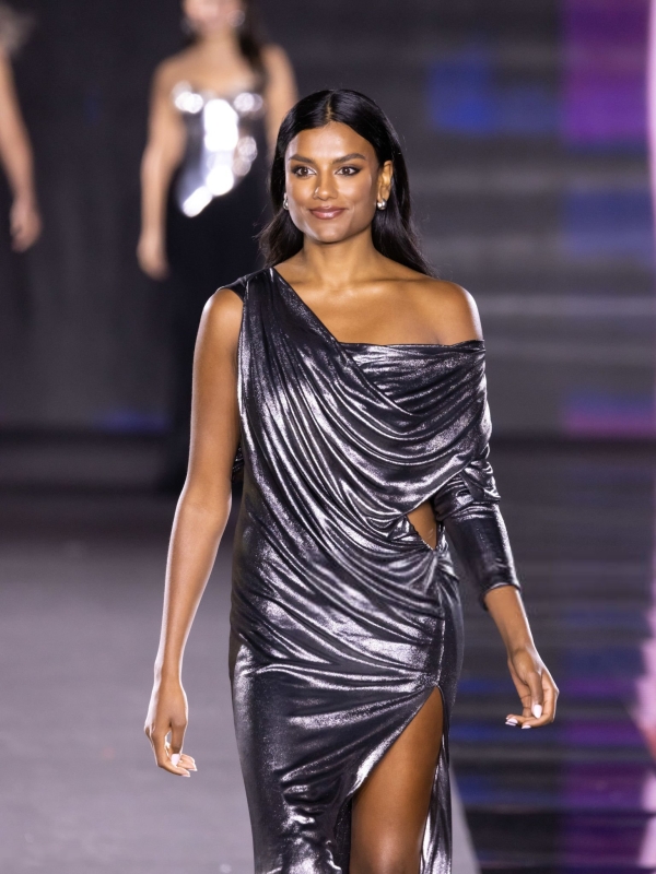 Simone Ashley walks the runway of the Walk Your Worth show, hosted by L'Oréal Paris, on September 23, 2024 in Paris, France
