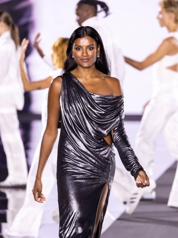 Simone Ashley walks the runway of the Walk Your Worth show, hosted by L'Oréal Paris, on September 23, 2024 in Paris, France
