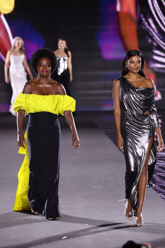 Simone Ashley and Viola Davis walk the runway of the Walk Your Worth show, hosted by L'Oréal Paris, on September 23, 2024 in Paris, France
