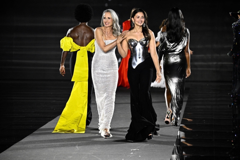 Simone Ashley and Viola Davis walk the runway of the Walk Your Worth show, hosted by L'Oréal Paris, on September 23, 2024 in Paris, France
