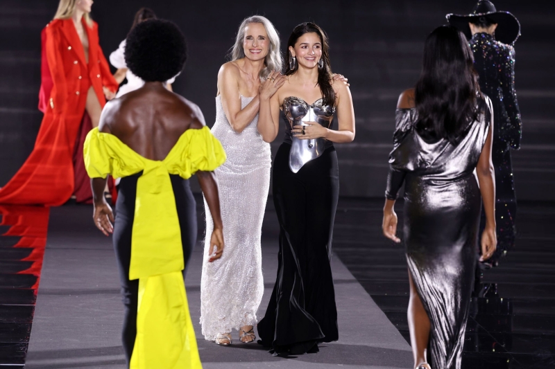 Simone Ashley and Viola Davis walk the runway of the Walk Your Worth show, hosted by L'Oréal Paris, on September 23, 2024 in Paris, France
