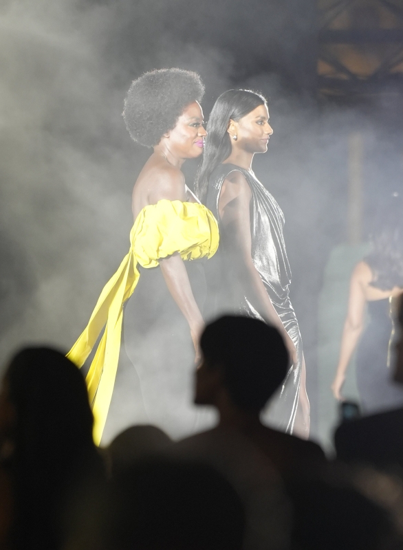 Simone Ashley and Viola Davis walk the runway of the Walk Your Worth show, hosted by L'Oréal Paris, on September 23, 2024 in Paris, France
