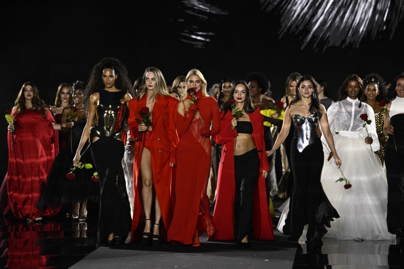 Simone Ashley walks the runway of the Walk Your Worth show, hosted by L'Oréal Paris, on September 23, 2024 in Paris, France
