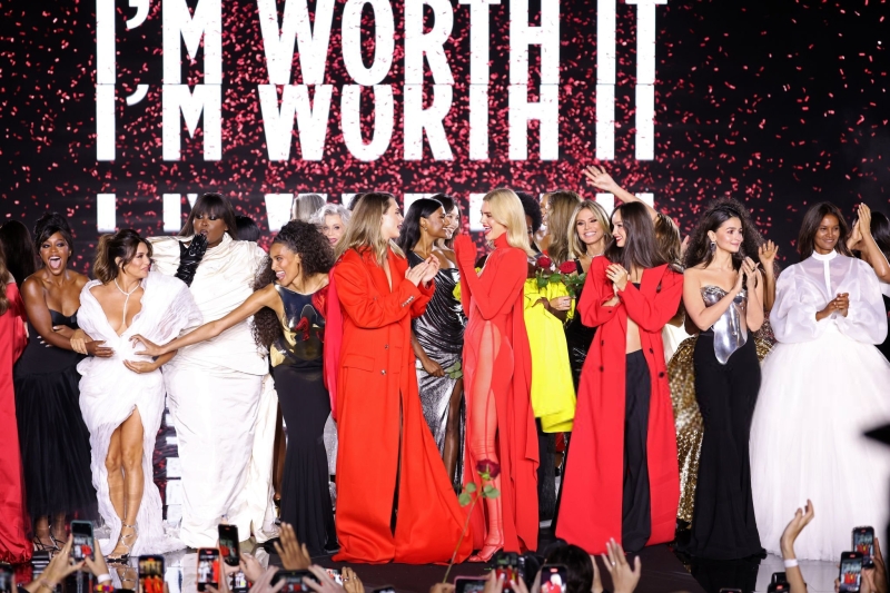 Simone Ashley walks the runway of the Walk Your Worth show, hosted by L'Oréal Paris, on September 23, 2024 in Paris, France
